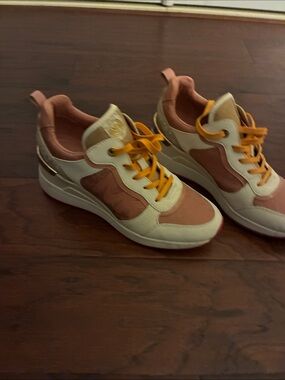 Michael Kors women’s White, Pink & Cream Slight Wedge Sneakers with Orange Laces